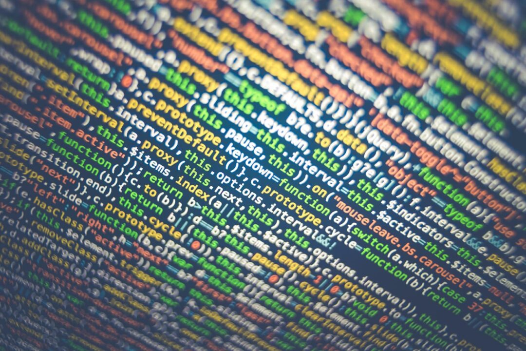 Code in different colours on a screen. Kod i olika färger på en skärm.